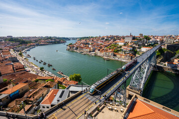 Fototapeta na wymiar Amazing panoramic view of Oporto and Gaia with Douro river, aerial view, Porto, Portugal