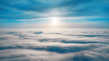Aerial view from a drone flying above the clouds