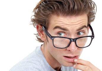 Surprised, glasses and man in shock or anxiety, worried face and isolated closeup on white studio background. Omg, wow or wtf and nerd looking confused with doubt, fear or worry, stress or shock
