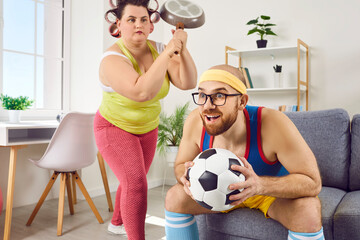 Funny angry frustrated evil housewife overwhelmed by bad mood emotions raises culinary skillet pan...
