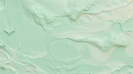 cream texture in pastel green and turkis colors, top view
