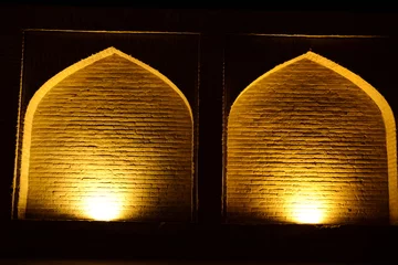 Foto auf Acrylglas Khaju-Brücke Khaju Bridge in Isfahan lit up at dusk in Iran
