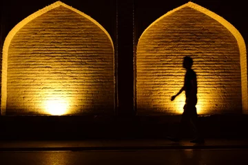 Velvet curtains Khaju Bridge Khaju Bridge in Isfahan lit up at dusk in Iran