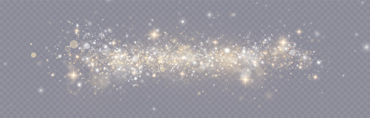 Golden glitter.Light effect.Glittering particles background. Gold dust on a transparent background.