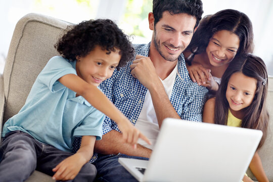 Laptop, watch and happy family father, children or people point at online shopping choice, social media video or meme. Happiness, love and group of kids with dad streaming movie in home living room