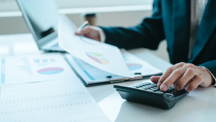 Bookkeeping financial auditing administrator asian business man making reports, calculating balance sheet. Income auditing service within audit concept, Accrued Incomes, Capital Stock, Closing Entries