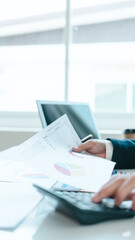 Bookkeeping financial auditing administrator asian business man making reports, calculating balance...