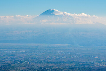 Mount Ararat and Ararat Plain on sunny autumn day. View from Mount Aragats slope, Armenia.