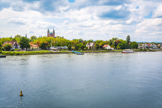 Speyer, Rhineland-Palatinate, Germany - 14 May 2023: Cityscape with harbor and  Rhine river with cathedral in background