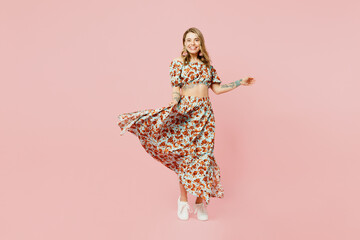 Full body fun happy cool cheerful joyful young blonde caucasian woman wears summer casual clothes...