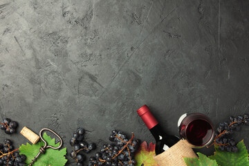 Wine composition on dark rustic background copy space