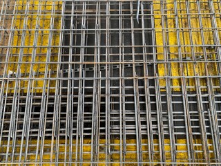binding of reinforcement of a monolithic reinforced concrete slab of a residential building before pouring concrete