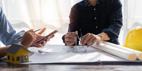 engineer team planning design house, modifying plan, creating construction project and addition according to customer requirement