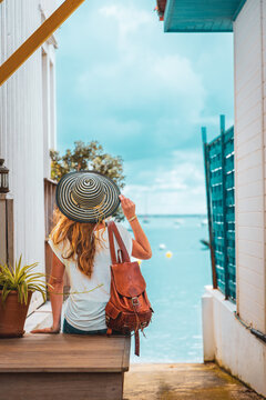 Woman tourist in fishing village- Coast of Arcachon- tourism in France,  Nouvelle aquitaine