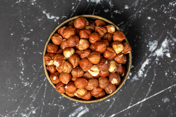 Hazelnut. Peeled hazelnuts in bowl. Superfood. Vegetarian food concept. Healthy snacks. Top view