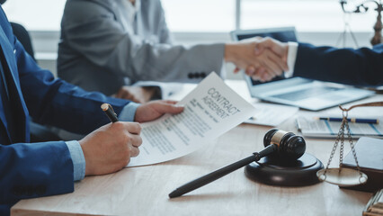 Shaking hands, Business lawyer team. Working together judge counselor having team meeting with client discussing legal legislation at law firm, Law and Legal services concept.