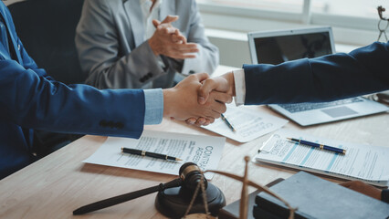 Shaking hands, Business lawyer team. Working together judge counselor having team meeting with client discussing legal legislation at law firm, Law and Legal services concept.