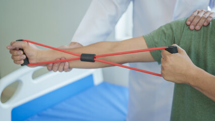 Professional massage therapist physiotherapy worker rehabilitation physiotherapy man at work with patient man client at clinic