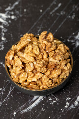 Walnut. Walnut kernel in bowl. Superfood. Vegetarian food concept. Healthy snacks. Close up