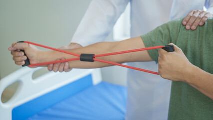 Professional massage therapist physiotherapy worker rehabilitation physiotherapy man at work with patient man client at clinic