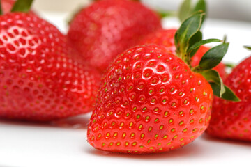 fresh juicy appetizing strawberries on a white background isolate studio shooting
