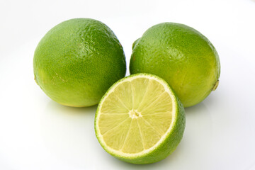 juicy fresh green lime on white background isolate studio photo 2