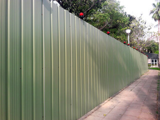 Building fence isolation steel plate. Stainless steel plate. Industrial tank wall shapes. For roofing and roofing construction. Quarantine the construction site. Colored metallic steel profile panels.