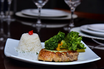 grilled fish with vegetables, grilled fish fillet with rice and broccoli salad

