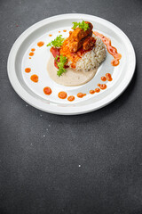 rice chicken meat tomato sauce second course healthy meal food snack on the table copy space food background rustic top view