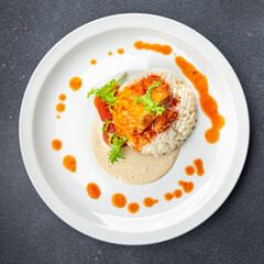 rice chicken meat tomato sauce second course healthy meal food snack on the table copy space food background rustic top view