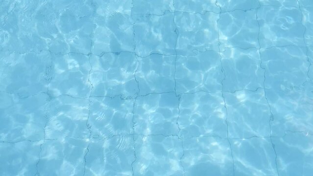swimming pool waves. water wave on blue swimming pool.