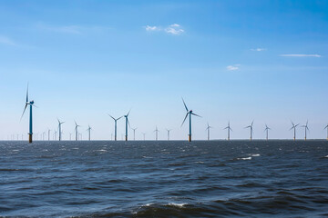 Windmill farm in the ocean Westermeerwind park, windmills isolated at sea on a beautiful bright