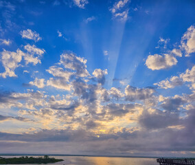 cloudy sunrise with sun rays