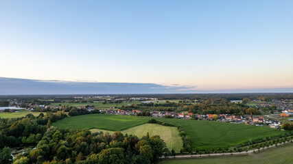 Naklejka premium Aerial view with drone of the beautiful city Turnhout in Belgium, Europe, as seen from the harbor. High quality photo. High quality photo