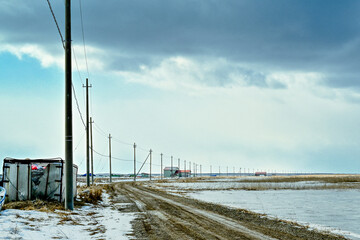 北海道の田舎道、雲の合間からの太陽がきれい