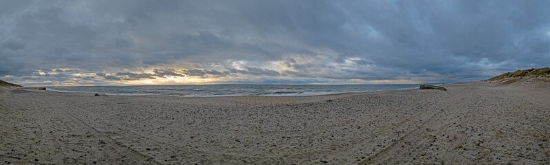 Panoramic picture over a beach in Jutland in rough weather