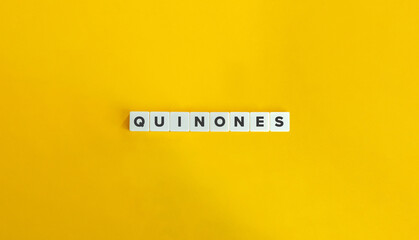 Quinones Word on Block Letter Tiles on Yellow Background. Minimal Aesthetics.