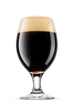 Snifter glass of fresh dark stout beer with cap of foam isolated. Transparent PNG image.