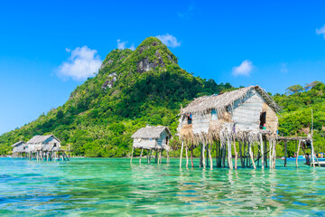 Beautiful landscapes view borneo sea gypsy water village in Bodgaya Island, Semporna Sabah, Malaysia. - obrazy, fototapety, plakaty