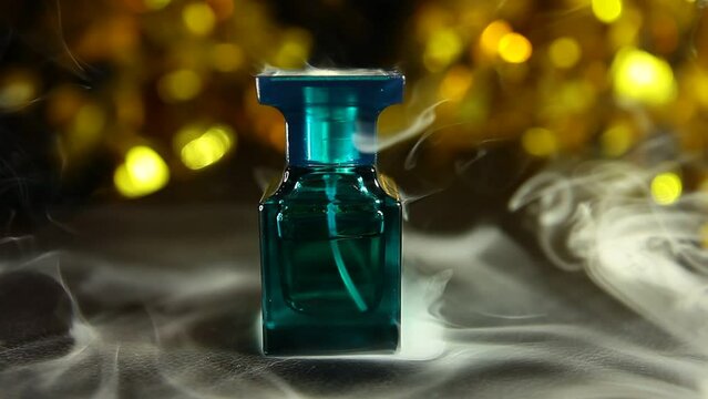 footage of glass perfume bottle smoke