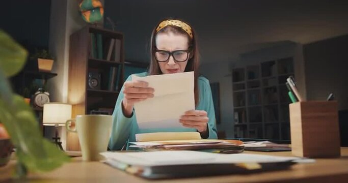 Woman receiving an expensive invoice