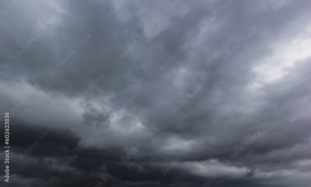 Aufkleber the dark sky with heavy clouds converging and a violent storm before the rain.bad or moody weather s