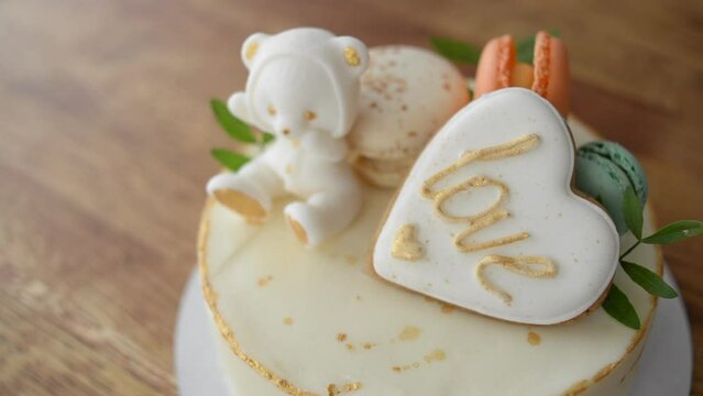 Holiday cake with beautiful decorations on a wooden table. Birthday cake.