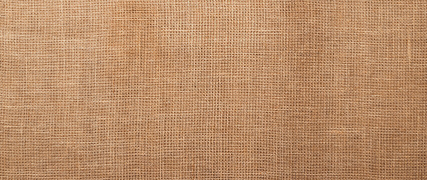 Jute pattern, rough burlap texture, canvas coarse cloth, brown woven rustic bagging. Natural hessian beige textile texture. Linen fabric backdrop. Threads background. Sackcloth surface, material.