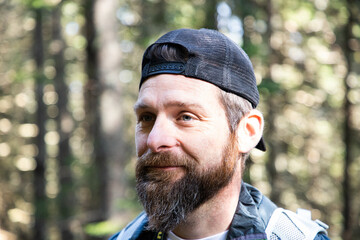 handsome man portrait in the forest