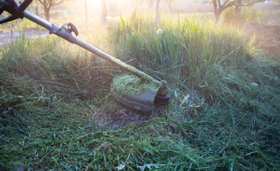 mowing a lawn with lawn mower