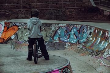 Boy on bike, BMX skate park Hastings UK