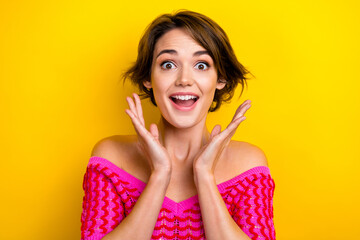 Photo of cute impressed girl bob hairstyle dressed off shoulder shirt staring at unexpected discount isolated on yellow color background - obrazy, fototapety, plakaty
