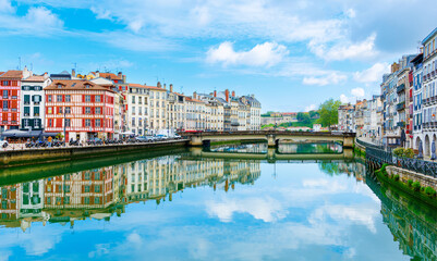 Panorama of Bayonne with bridge and colored house- Aquitaine, basque country - obrazy, fototapety, plakaty