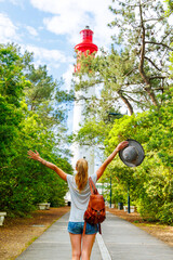 Woman tourist enjoying lighthouse of Cap Ferret in Arcachon bay- Tourism in France